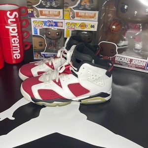 Carmine 6s size 6Y